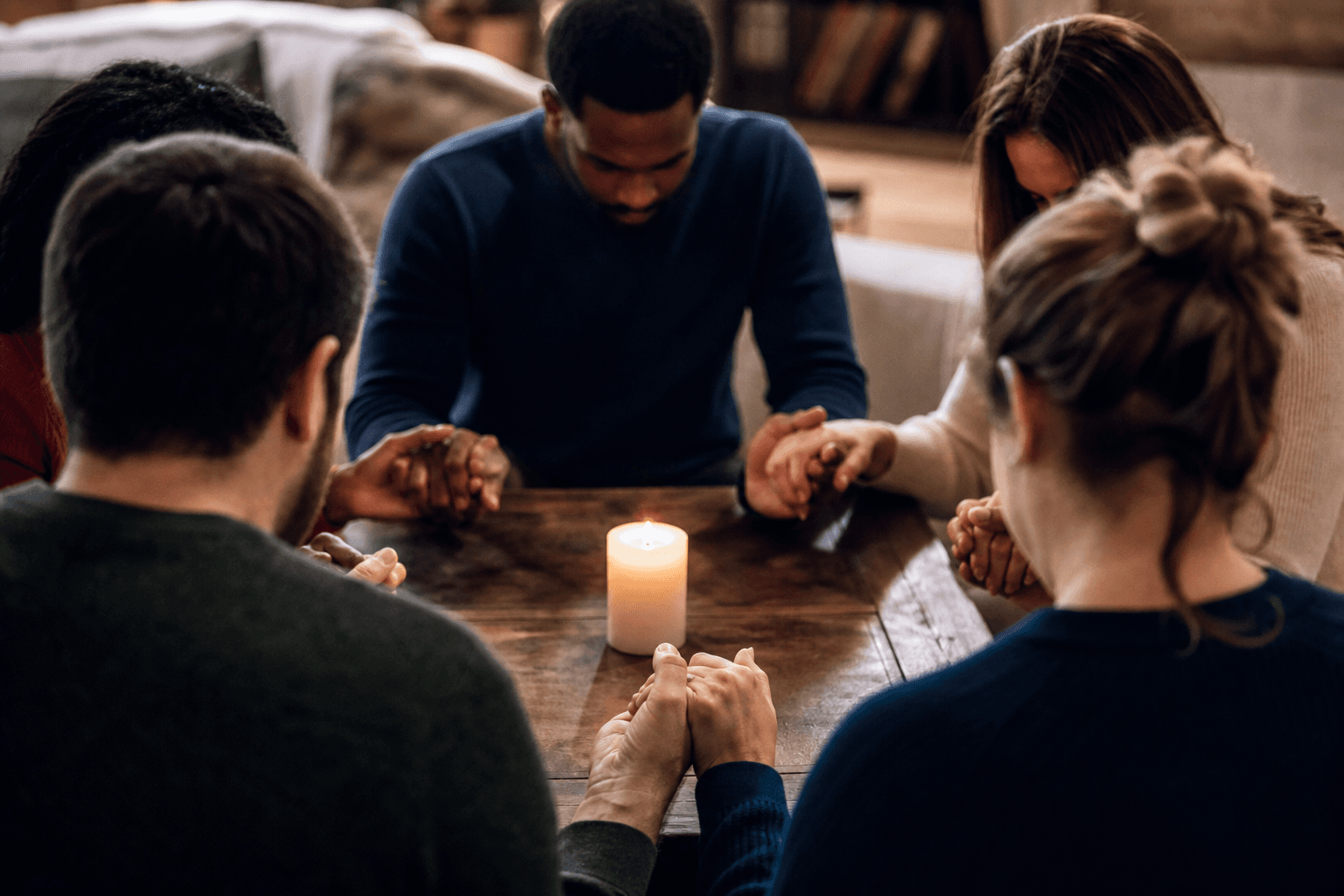People gathered in prayer and outreach